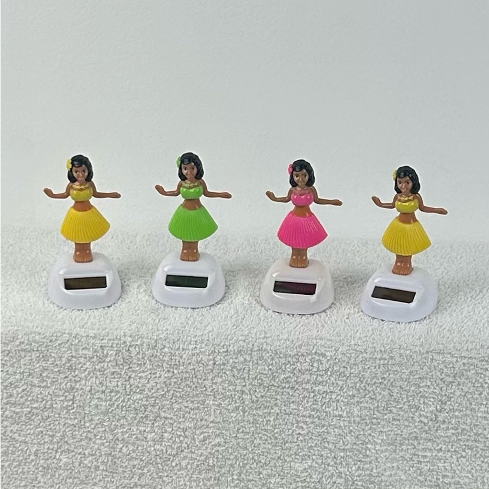 4- Colorful Solar-Powered Dancing Hula Girls – All come in original packaging